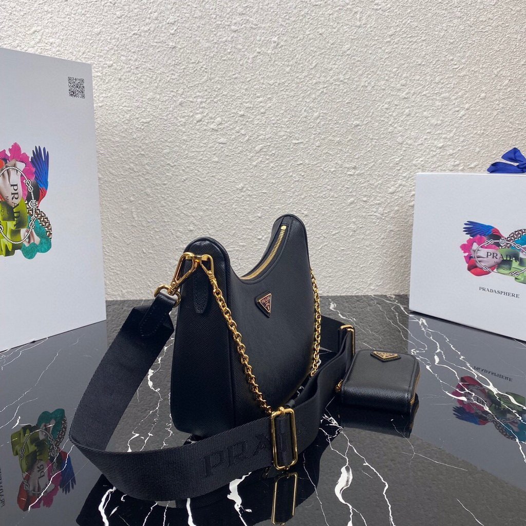 65324fb8a6140.jpg Replica Prada 1BH204 Prada Re-Edition 2005 Saffiano leather Bag in Black - Image 1