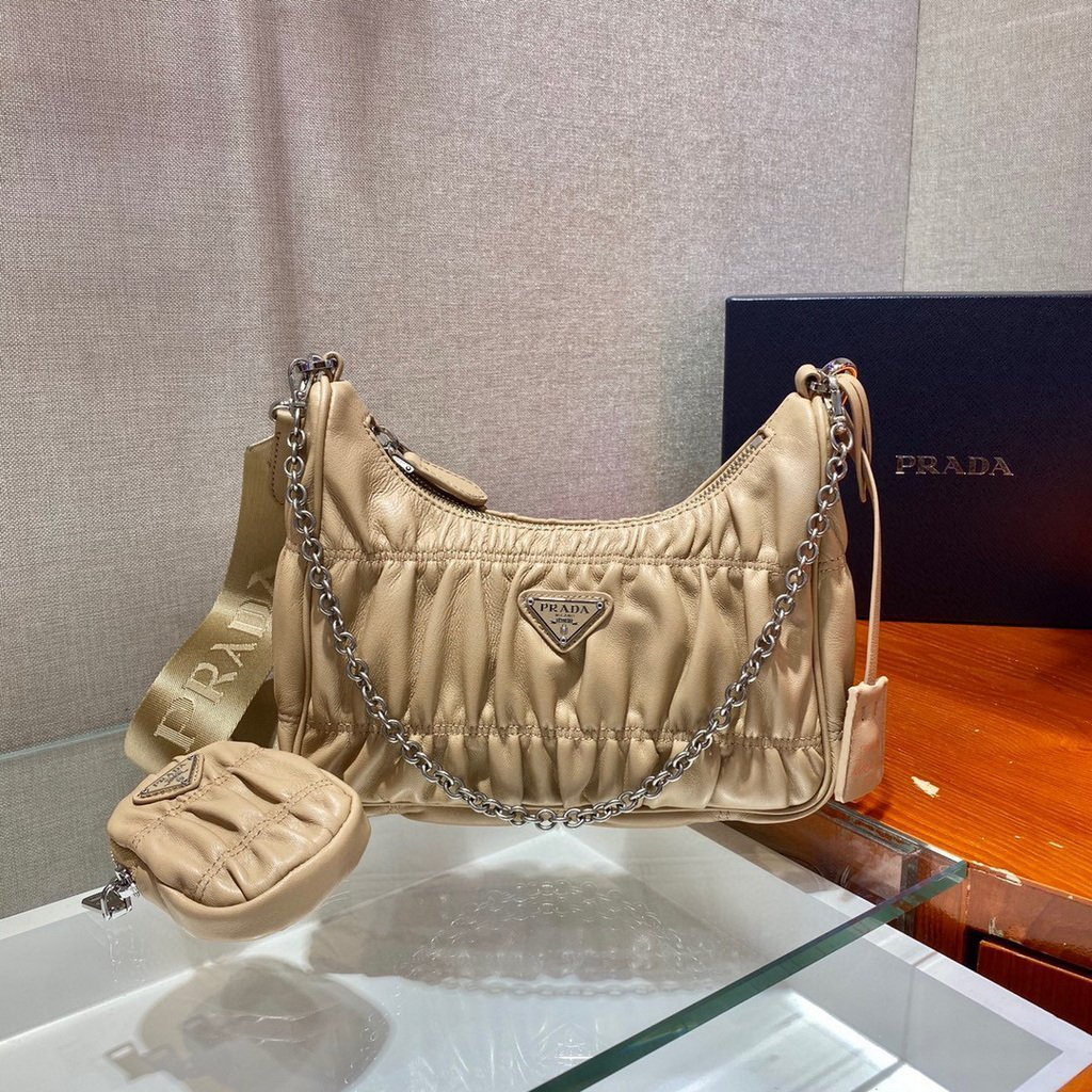 653250158a1fb.jpg Replica Prada 1BH204 Mini Bags Prada Crossbody Leather bag In Apricot - Image 1