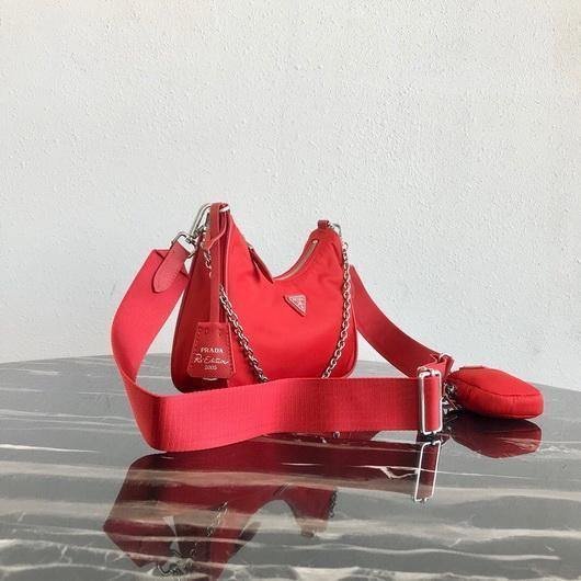 653256c3b0bfc.jpg Replica Prada 1BH204 Prada Re-Edition 2005 Nylon Bag Red - Image 1