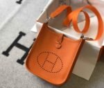 Replica Hermes Evelyne Bag Hermes Mini Crossbody Bag 20405 Silver Buckle Orange