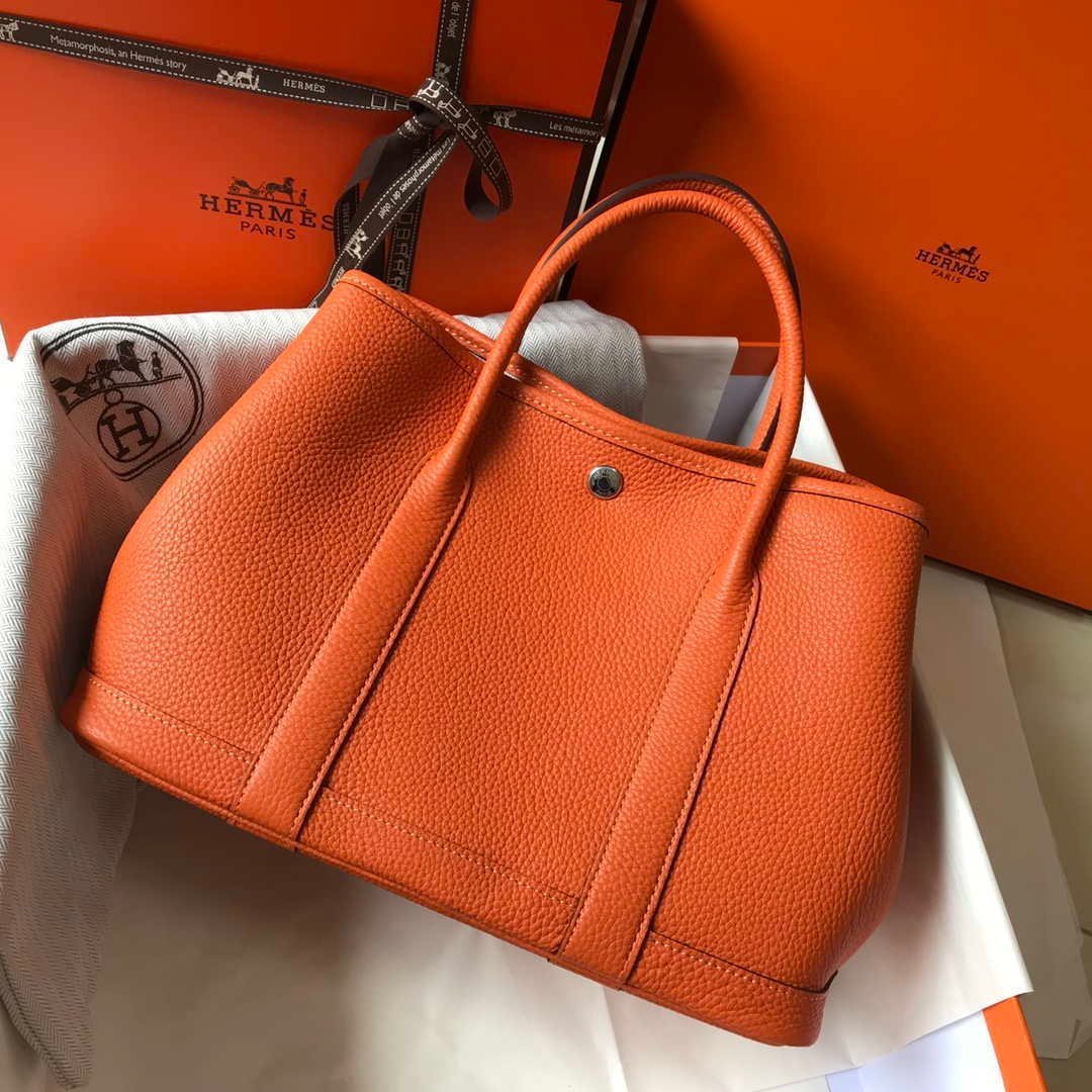 6532783a0d8a7.jpg Replica Hermes Orange Togo Medium Garden Party 36cm Bag H239058 - Image 1
