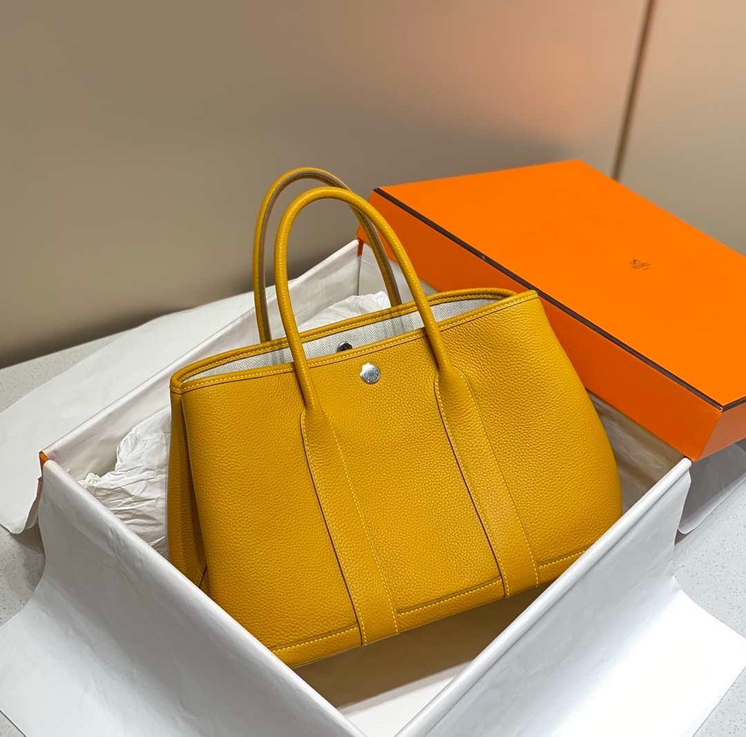 653278fedeba0.jpg Replica Hermes Yellow Clemence Garden Party 30cm Bag H239041 - Image 1